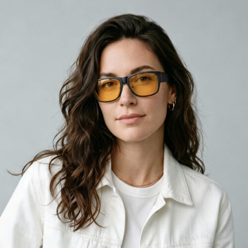Amber Shield Square Fitover Light Sensitivity Glasses – Regular Fit2 Female Model wearing Amber Shield Square Fitover Light Sensitivity Glasses – Regular Fit