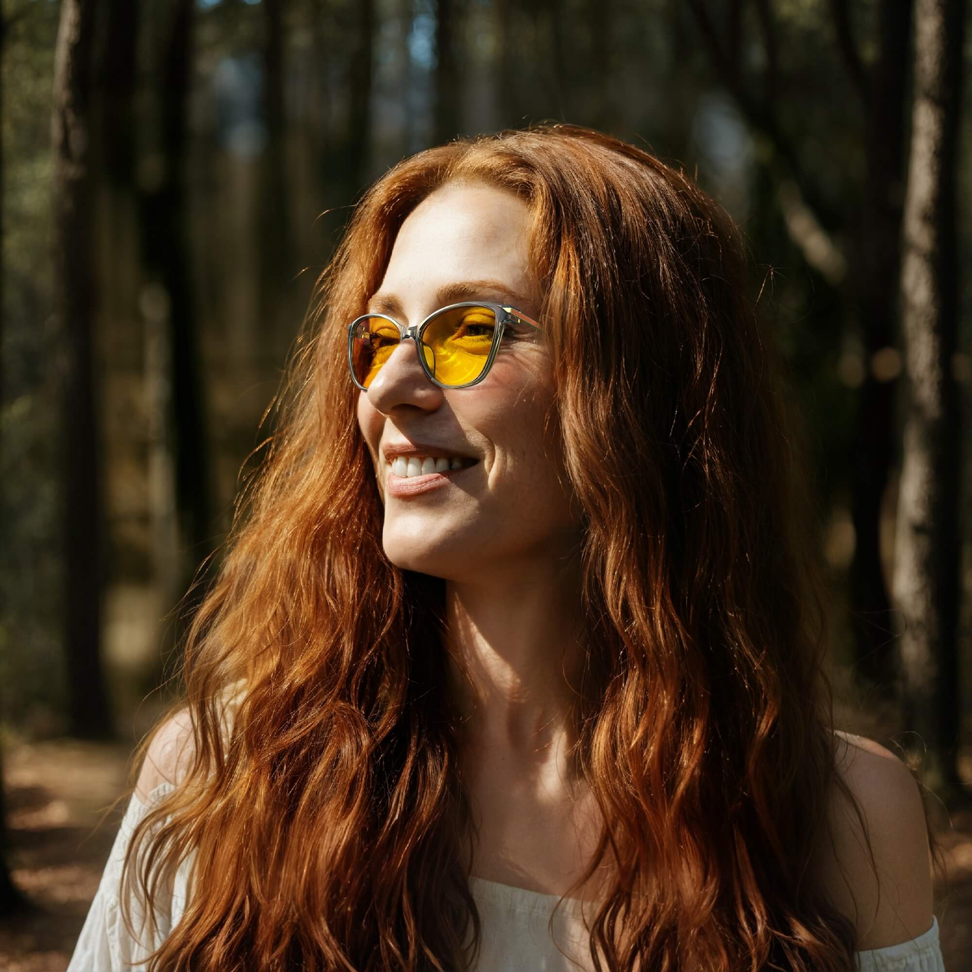 an old female is wearing amber shield cat eye light sensitivity glasses with grey frame and going outside