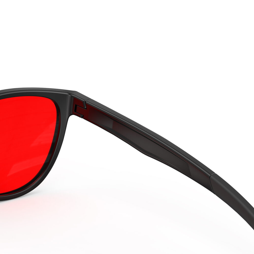 A Hinge closeup of Gloojo Night Ease Oval Red Colored Glasses for sleep - Black