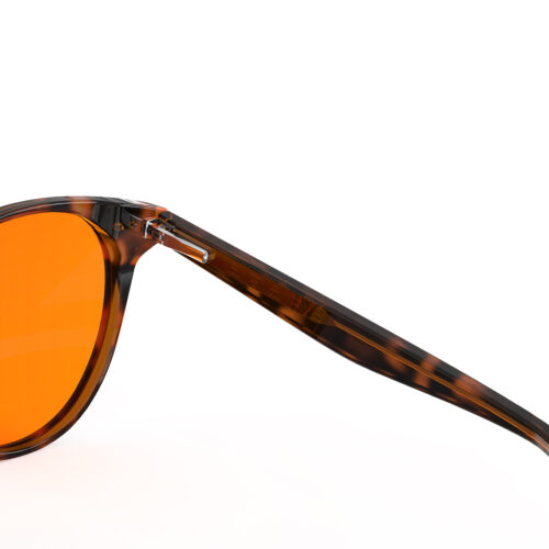 A Hinge closeup of Gloojo Night Ease Orange Lens Round Sleep Glasses – Tortoiseshell