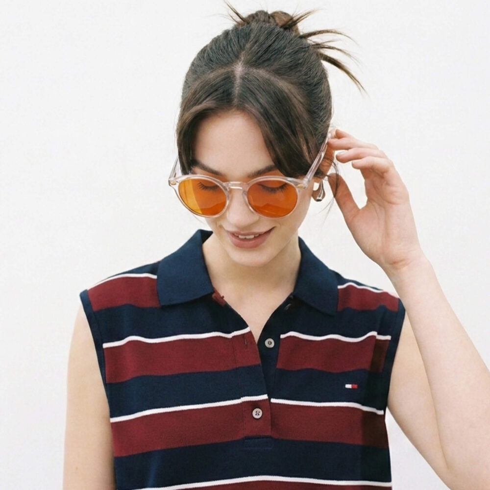 158-Female model showcasing Gloojo Night Ease orange-lens glasses for circadian rhythm protection