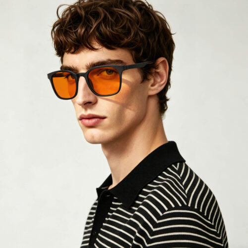266-Male model wearing Gloojo Night Ease orange lenses to protect his nighttime rest
