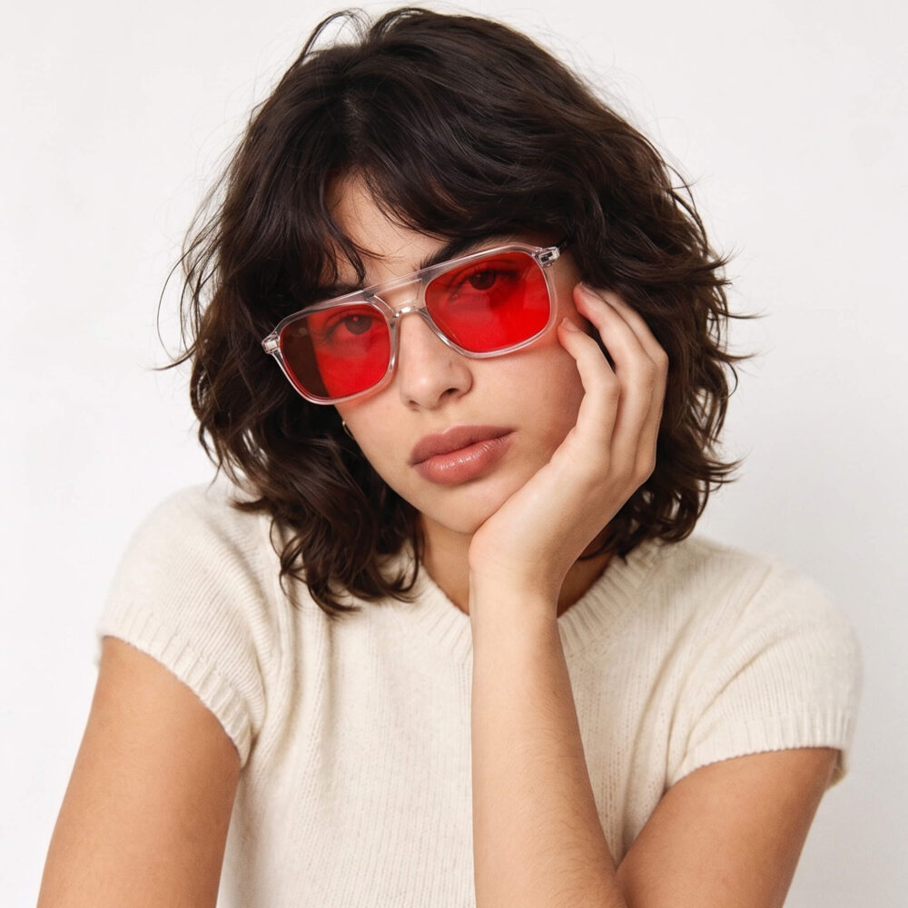 3093-Close-up portrait of a model showcasing Gloojo Night Ease red-lens sleep recovery eyewear