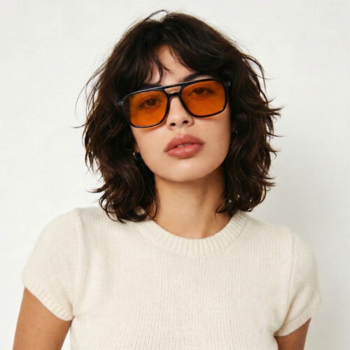 3093-Female model featuring Gloojo Night Ease orange-tinted eyewear for enhanced rest