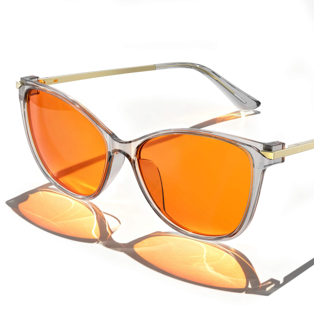 Gloojo Night Ease Sleep Glasses with orange lenses and a transparent grey cat-eye frame