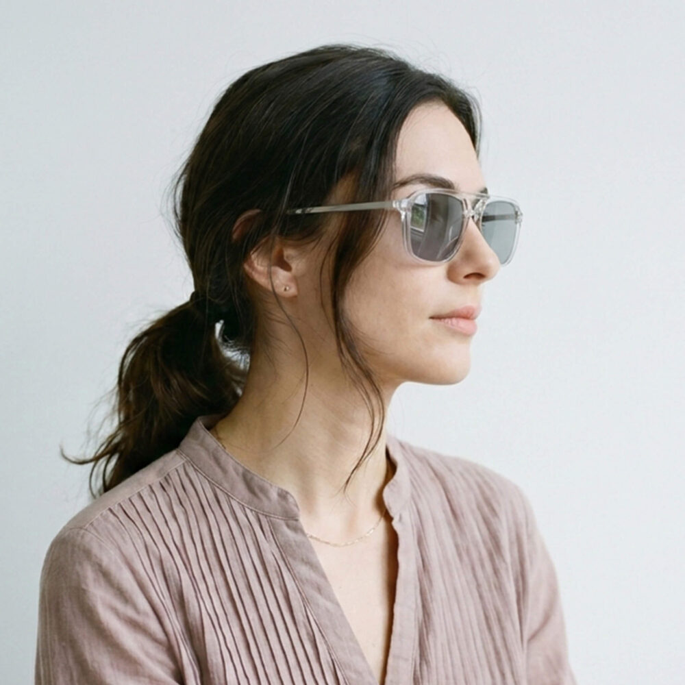 Female Model wearing Gray Relief Oval Aviator Migraine Glasses – Clear